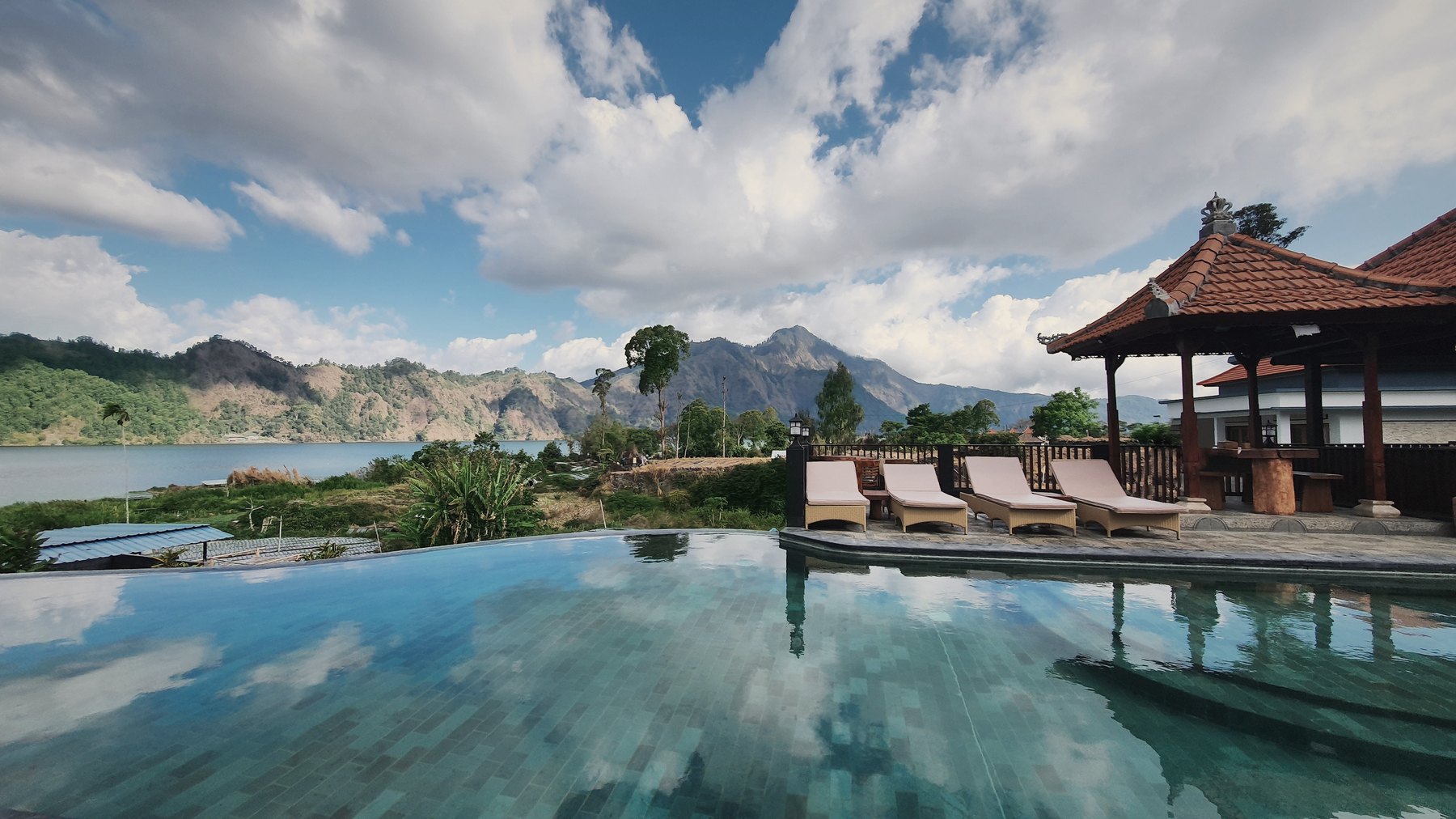 A calm pool beside a lake