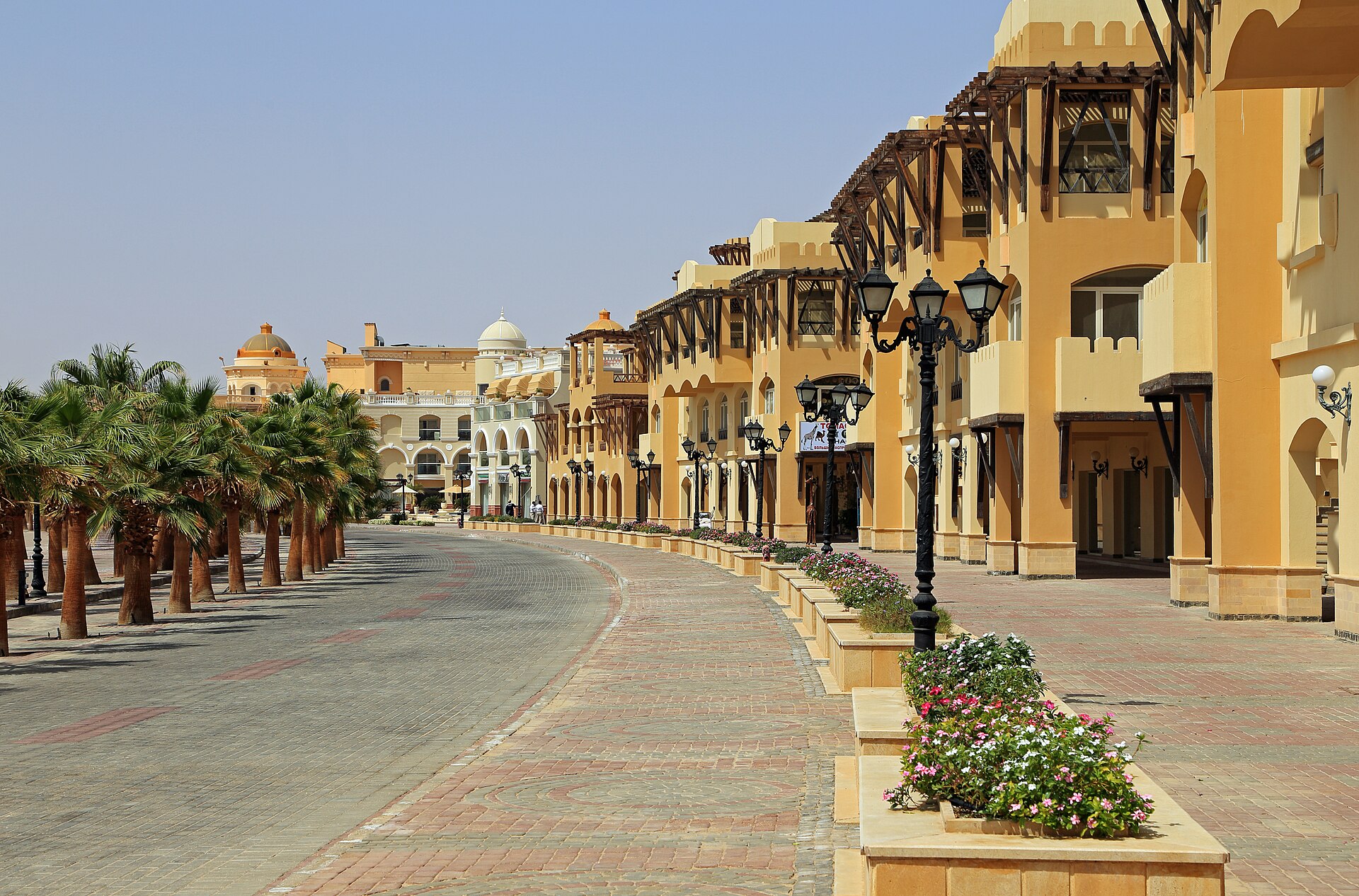 Palm-lined promenade and Egyptian resort architecture in Sahl Hasheesh on the Red Sea coast